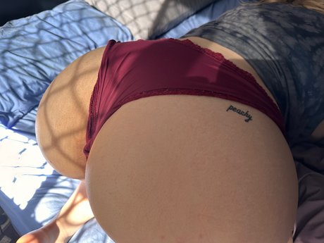 Peachy Caity pretty pornstar photo