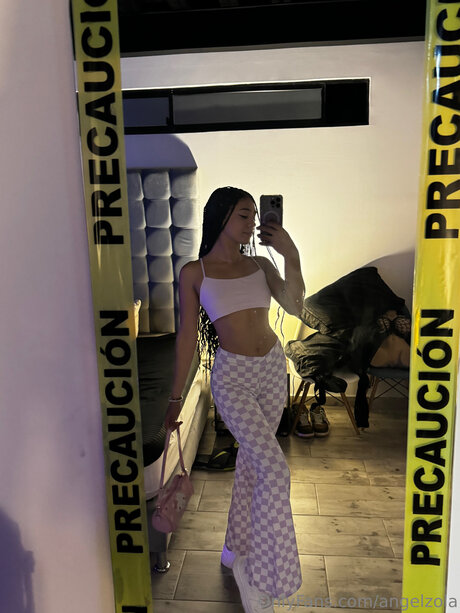 Angelzola pornographic model photo