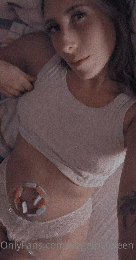 angelbetween model hot photo