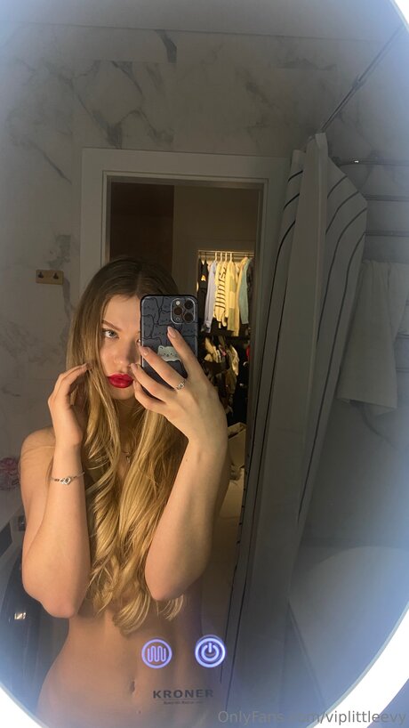 Cute Blonde Evy model sexy pics