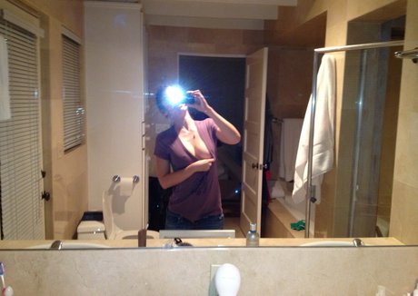 Lizzy Caplan model adult archive